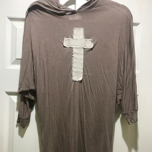 Nicole Paloma cross shirt.